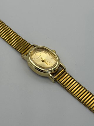 Reloj dorado acero inoxidable nuevo