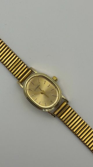 Reloj dorado acero inoxidable nuevo