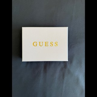 Cartera Guess azul y dorada