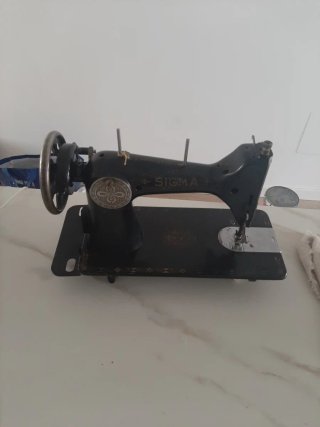 Máquina de coser Sigma antigua