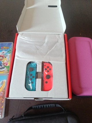 Nintendo Switch OLED con 2 Juegos y 2 fundas