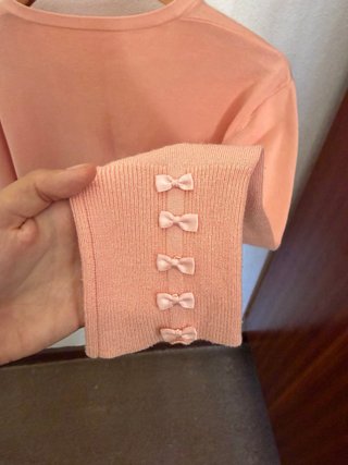 Casaco de malha rosa