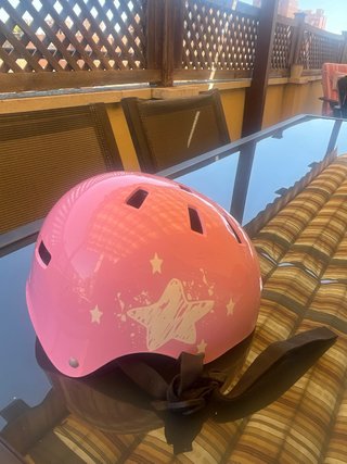 Casco de bicicleta rosa