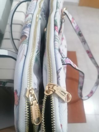 Bolso nuevo Parfois blanco con estampado tropical.