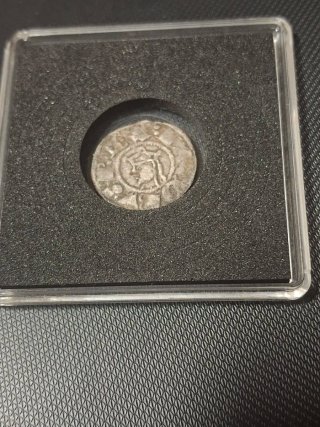Moneda antigua con retrato