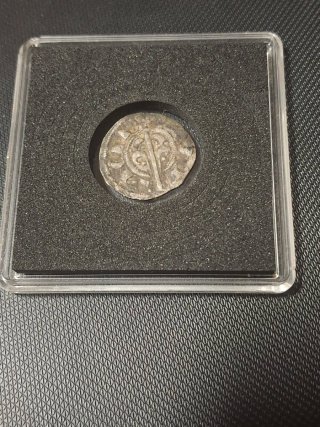 Moneda antigua con retrato