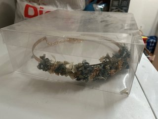 Cinturón flores preservadas.
