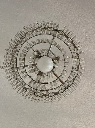 Lámpara de araña de cristal y metal