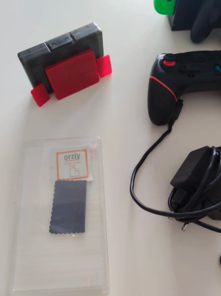 Nintendo Switch + Accesorios y Juegos