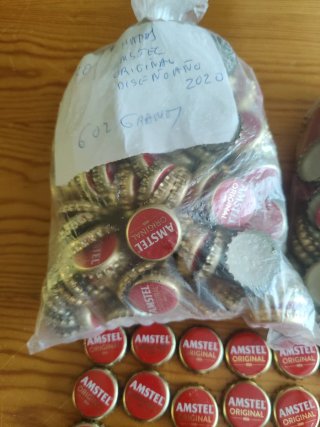 1000 Chapas Amstel Original