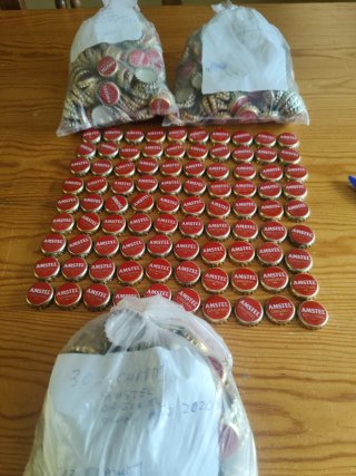 1000 Chapas Amstel Original