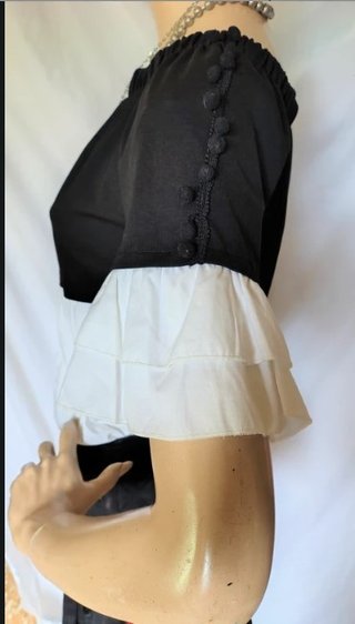 Top elegante estivo bianco e nero