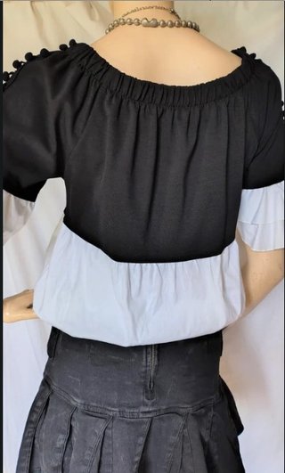 Top elegante estivo bianco e nero