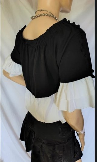 Top elegante estivo bianco e nero
