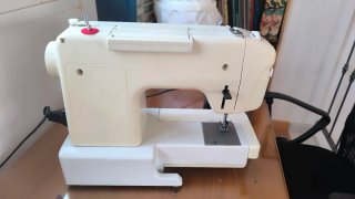 Máquina de coser Sigma 519