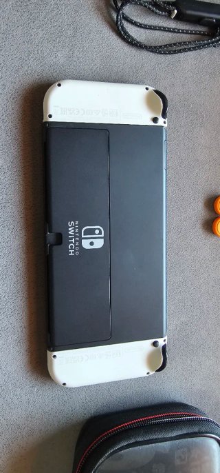Nintendo Switch OLED Naranja y Blanco