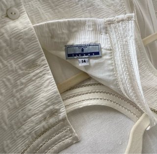 Precioso vestido de comunión blanco de TIZZAS