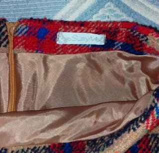 Minigonna a quadri beige e rossa