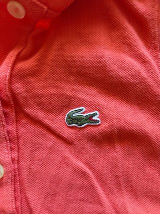 Polo Lacoste sin mangas coral Talla S/M