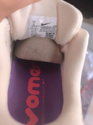 Nike Vomero 18 Mujer naranja/Morado