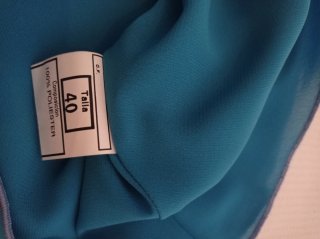 Blusa turquesa sin mangas