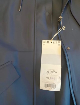 Gabardina impermeable Oysho azul marino