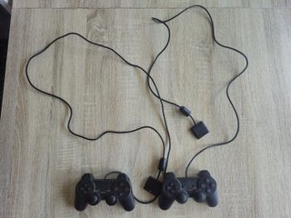 Playstation 2 Slim Nera + 2 Controller