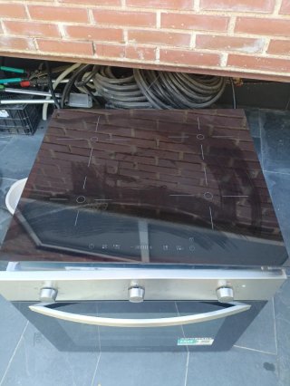 Horno más placa inducción 4 fuegos