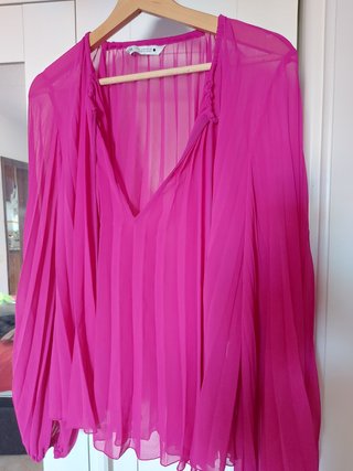 Varias camisas 6 euros cada una, pantalón 8