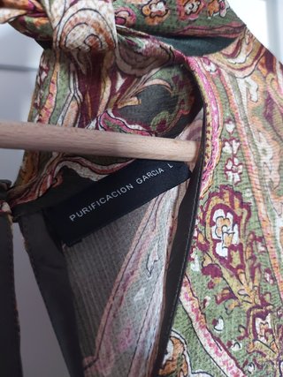 Varias camisas 6 euros cada una, pantalón 8