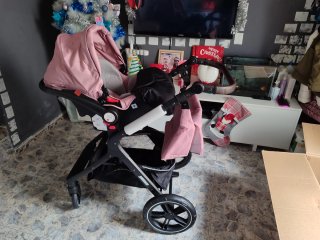 Carro de bebé rosa