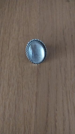 Colgante y anillo plata y marrón
