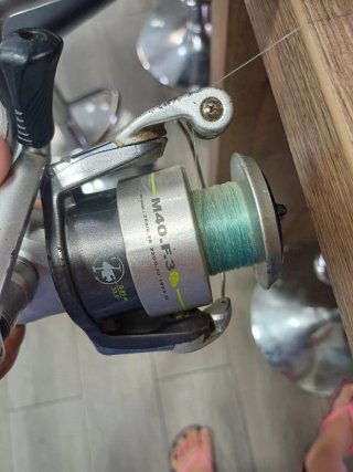 Caña de pescar con carrete