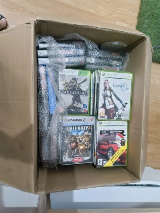 Collezione di videogiochi e console vintage