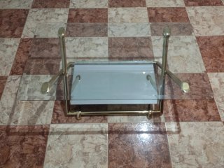 Mesa de centro cristal y metal dorado