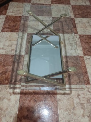 Mesa de centro cristal y metal dorado