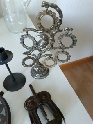Lottanti di antiquariato: candelabro, cavatappi, ecc.