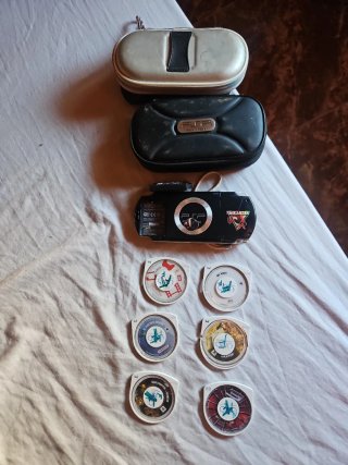 PSP Nera + 6 Giochi e caricabatterie originale!