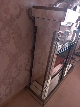 Chimenea de cristal plateado
