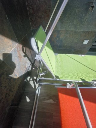 Tumbonas plegables naranja y verde