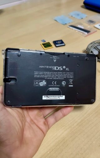 Consolle Nintendo DSi XL + Nintendo DS + Accessori