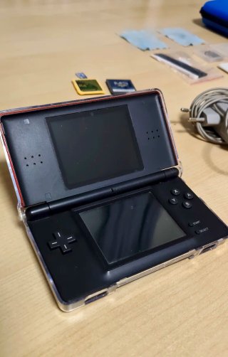Consolle Nintendo DSi XL + Nintendo DS + Accessori