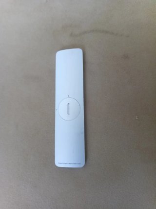 Apple TV con mando y caja