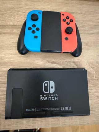 Nintendo Switch + custodia + controller + micro SD 128 GB +