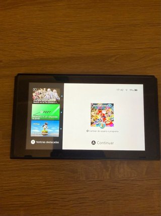 Nintendo Switch + custodia + controller + micro SD 128 GB +