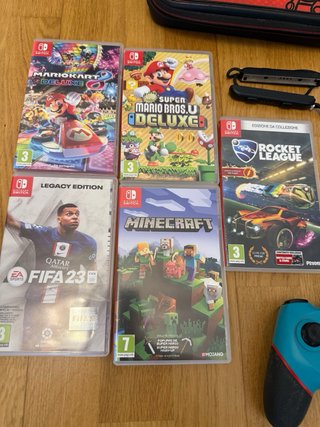 Nintendo Switch + custodia + controller + micro SD 128 GB +