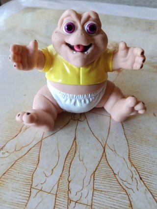 Figura Bebé Dino Sinclair Disney
