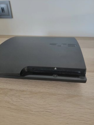 Console PlayStation 3 Slim (PS3) + 4 Giochi