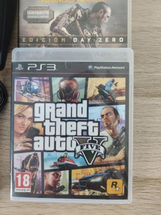 Console PlayStation 3 Slim (PS3) + 4 Giochi