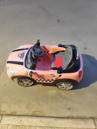 Coche a batería y mando para niños